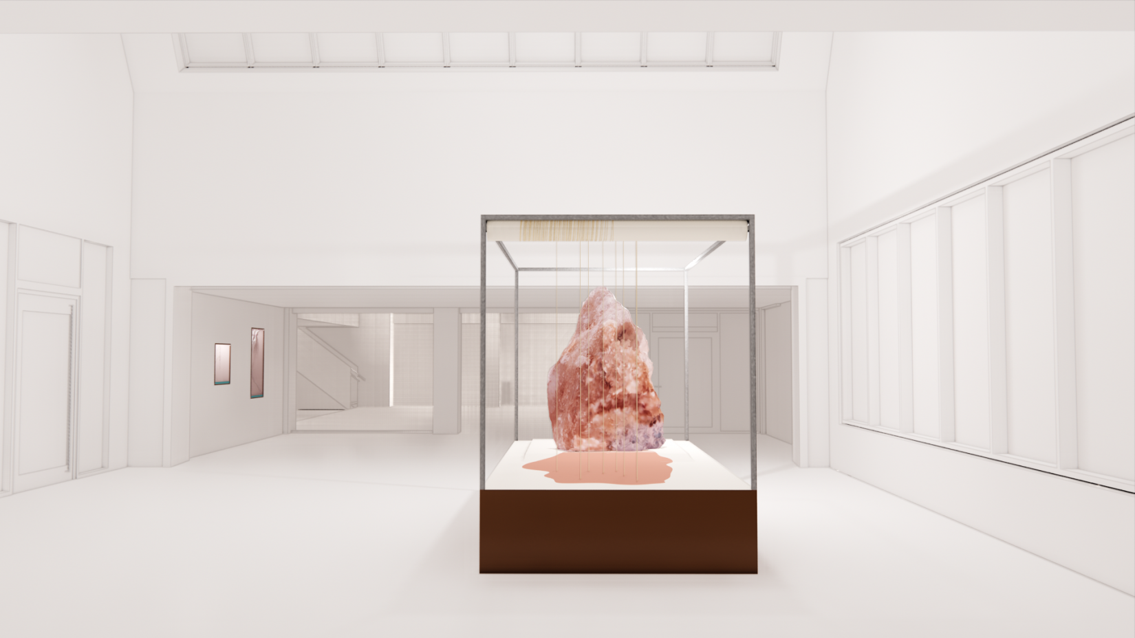 A pink stone in a monter.