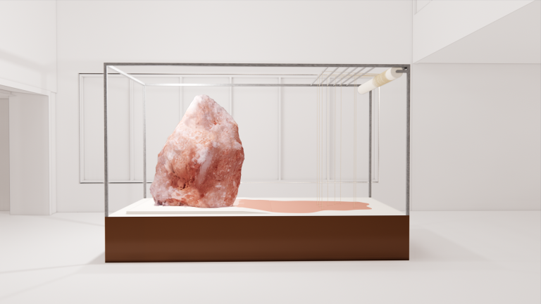 A pink stone in a monter.