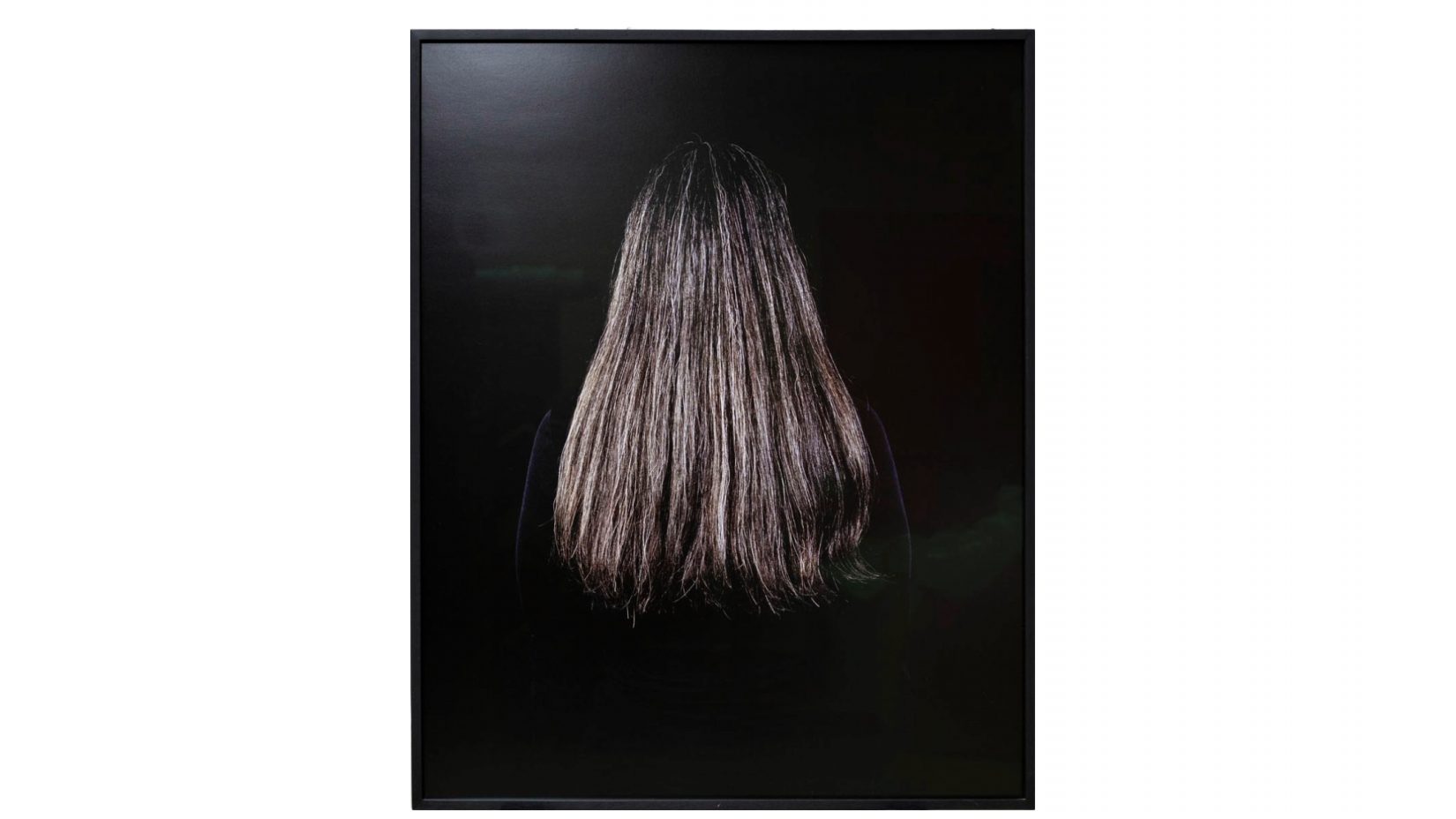 Ett foto på långt hår